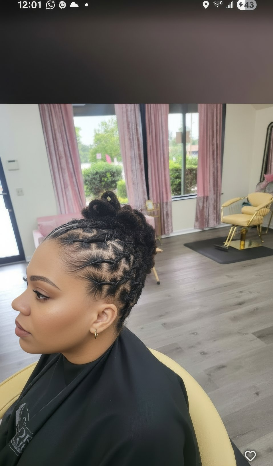 Loc updo bun by loctician in salon — dreadlock salon near me Middletown DE Sinkor Beauty Salon