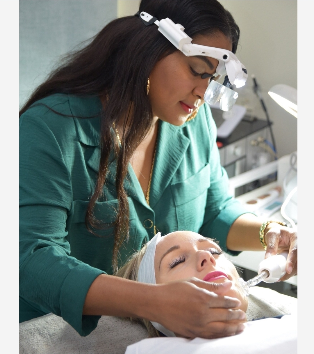 Licensed esthetician performing professional facial and microneedling skin rejuvenation treatment at Sinkor Beauty Salon Middletown DE